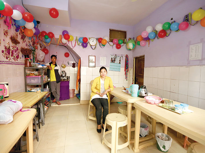 Tshachin’s cafe is decorated with balloons from a recent party. She offers Chin cuisine, and other refugees form the bulk of her clientele. Locals step in too, but only for tea or coffee. When she came here nine years ago, she cooked and sold her dishes from home. Opening the eatery was not a problem. “No,” she says, the authorities did not trouble her. Are people friendly and welcoming? “No.”<br><br>
“It’s a strange country. We don’t feel safe here. When we roam around, people often stare at us and make us feel unwanted,” she says. “People are not warm to us.” With her family, she has applied to emigrate to Australia. Will she be welcomed there? “Yes,” she says. Firmly.

